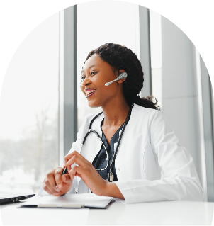 african-american-woman-doctor-working-her-office-online-using-portable-information-device-1